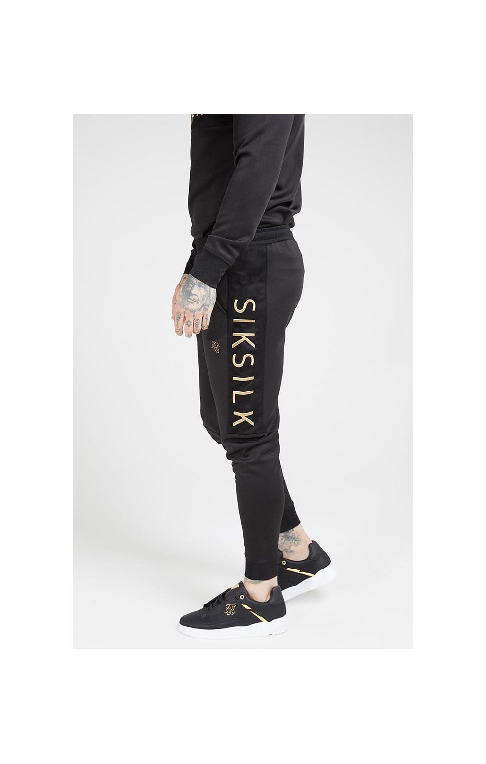 Load image into Gallery viewer, SikSilk Fitted Panel Cuff Pants – Black &amp; Gold (1)