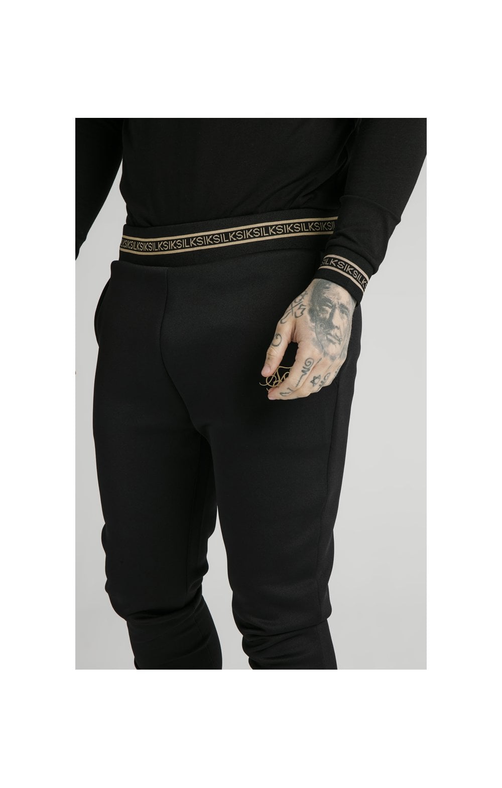 Load image into Gallery viewer, SikSilk Element Muscle Fit Cuff Joggers - Black &amp; Gold (1)