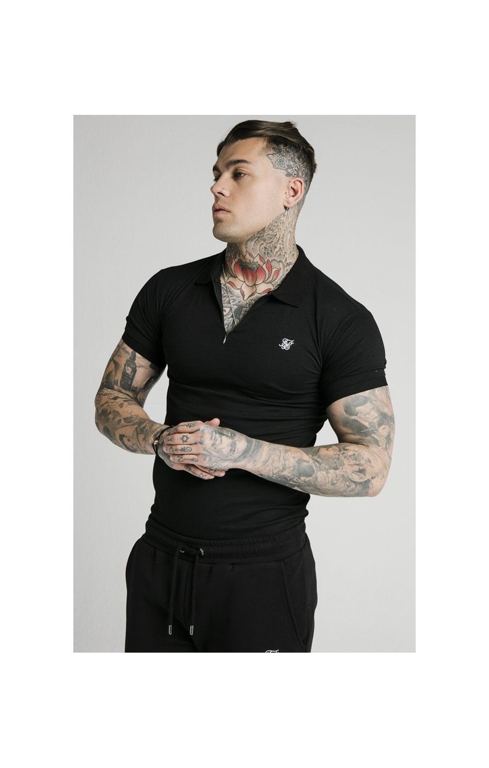 Load image into Gallery viewer, SikSilk S/S Inset Cuff Stretch Polo - Black