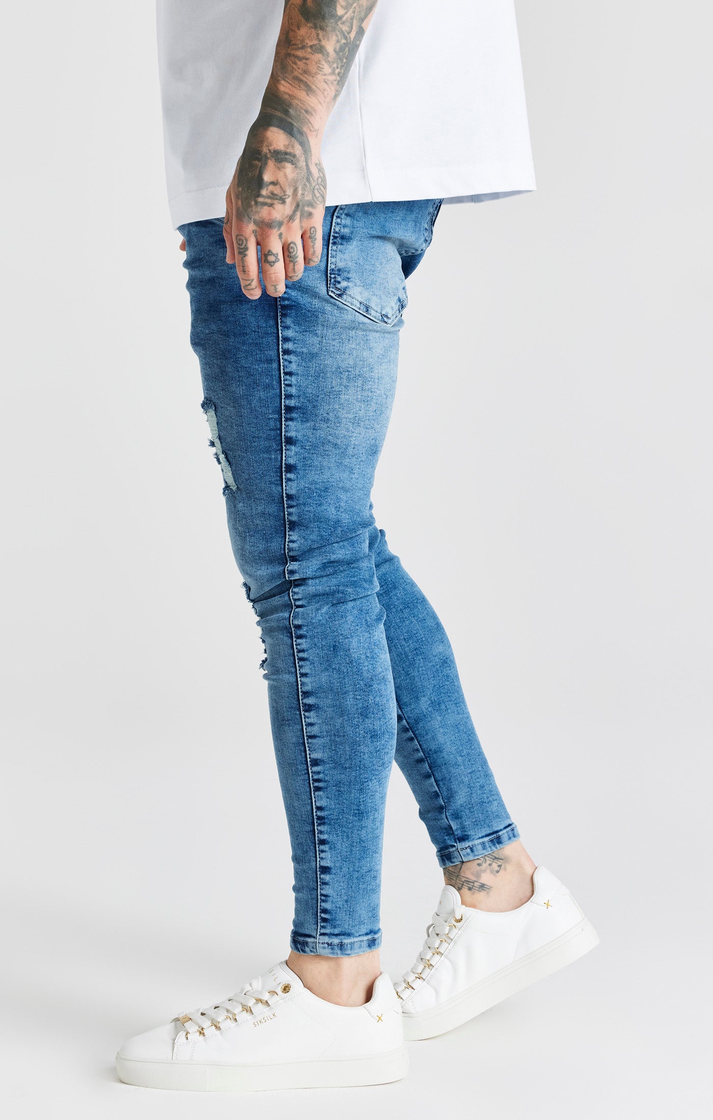 Load image into Gallery viewer, Blue Mid Wash Distressed Skinny Jean (1)