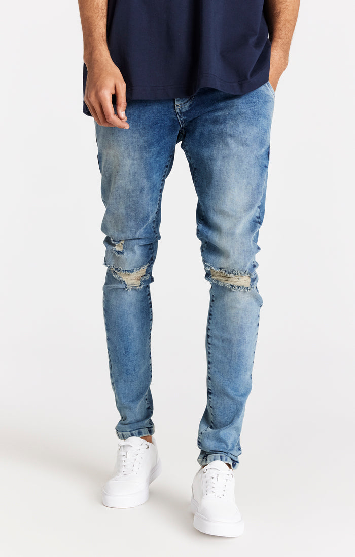 Load image into Gallery viewer, Light Blue Distressed Slim Fit Jean