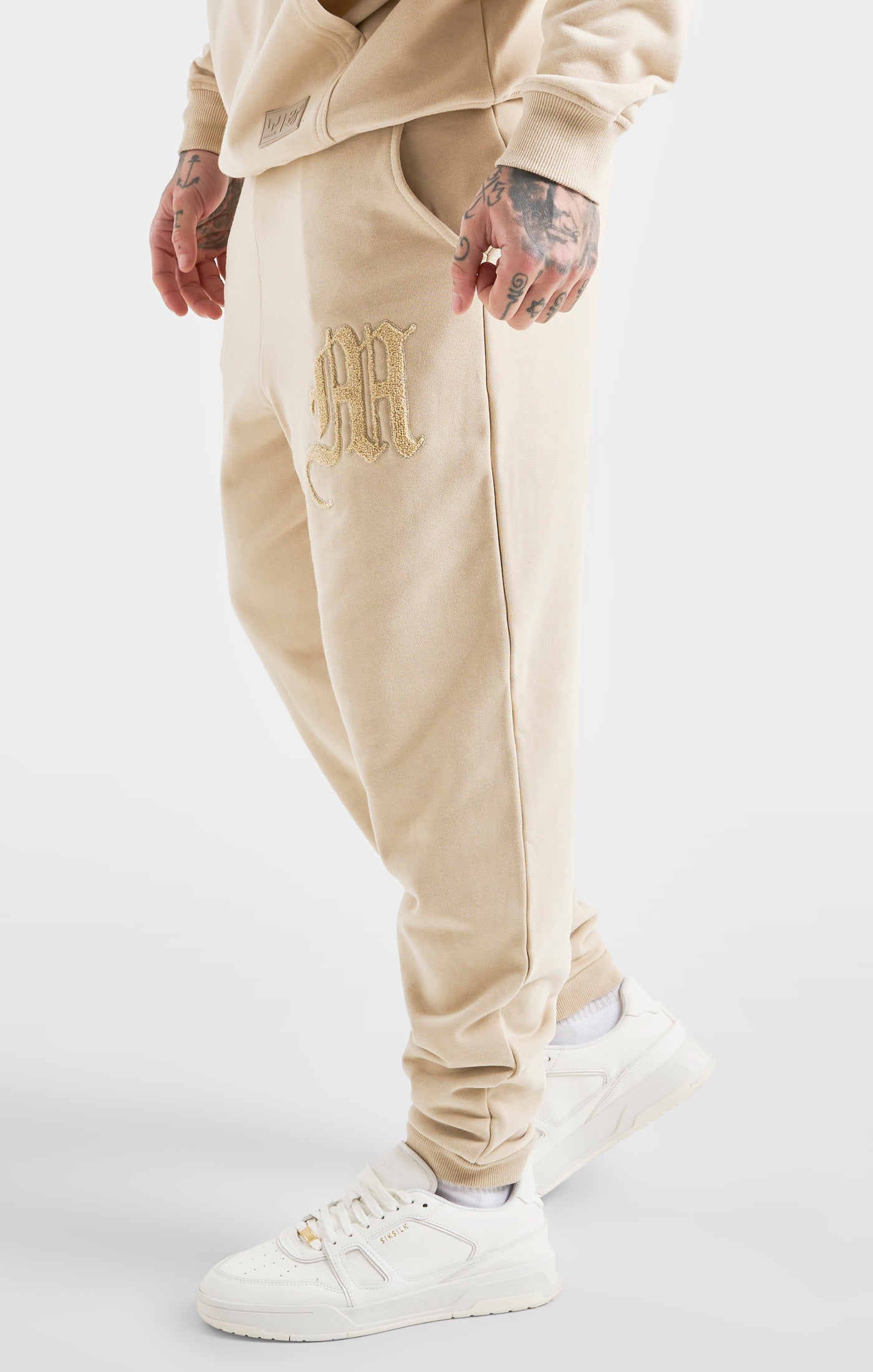 Load image into Gallery viewer, Messi x SikSilk Beige Logo Pant (1)