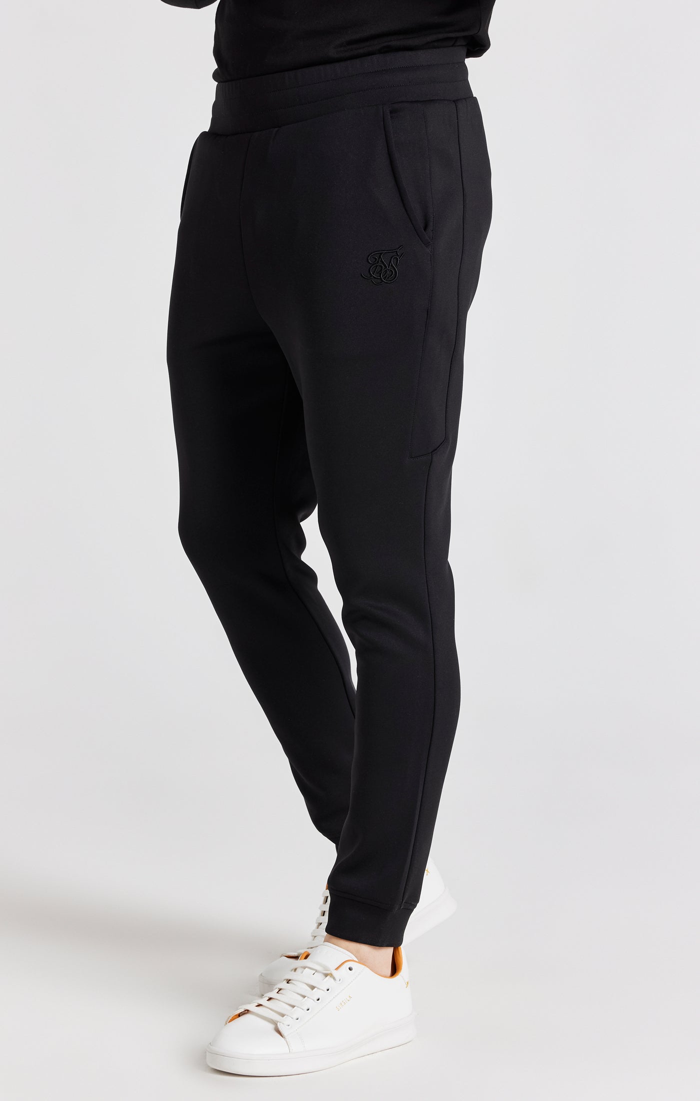 Load image into Gallery viewer, Black Embroidered Cuffed Track Pant