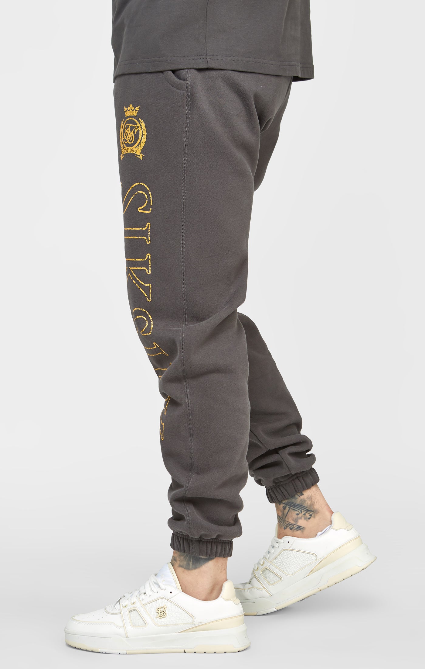 Load image into Gallery viewer, Black &amp; Gold Relaxed Jogger (1)