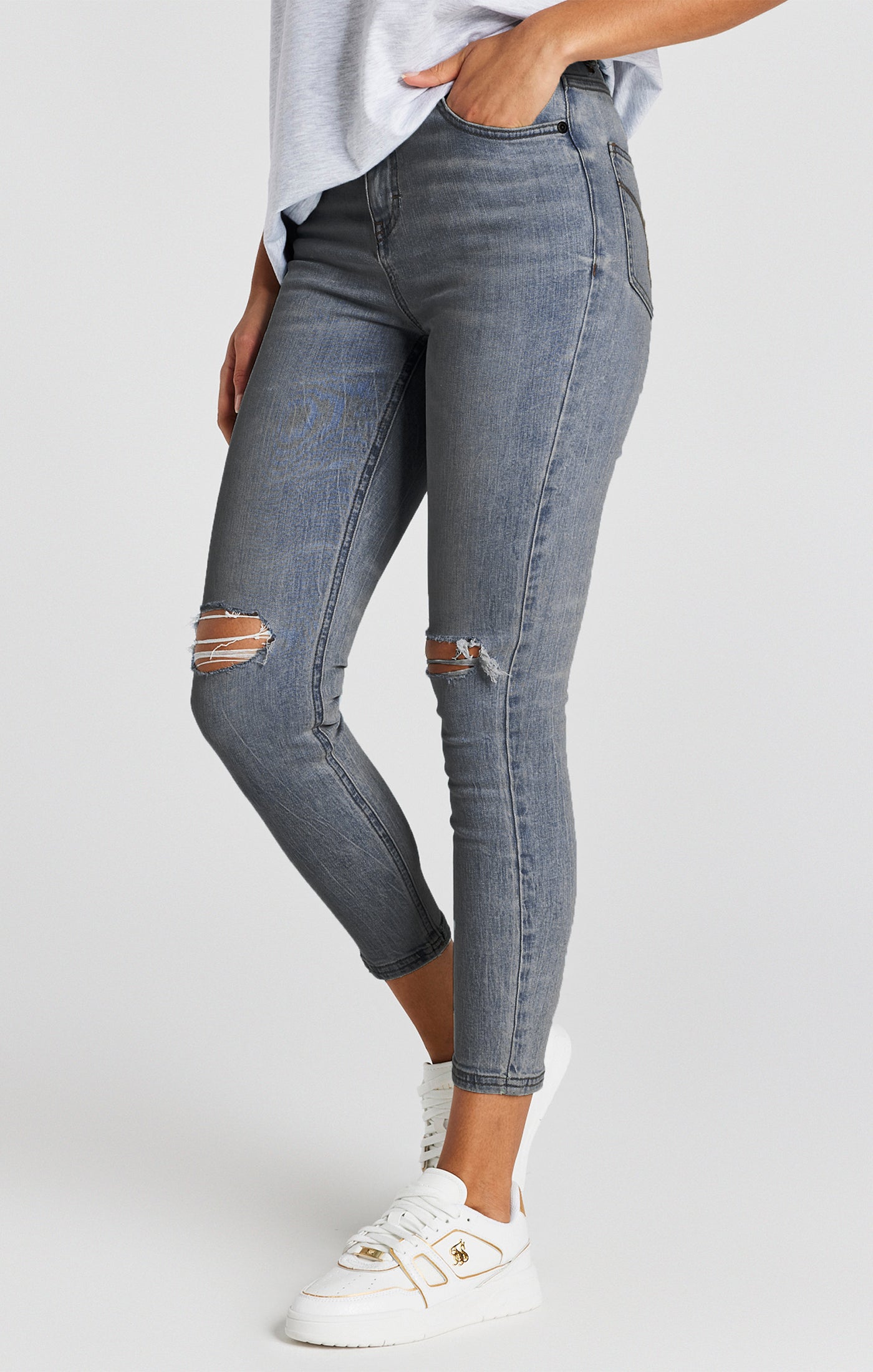 Load image into Gallery viewer, Light Blue Wash Distressed Denim Jean
